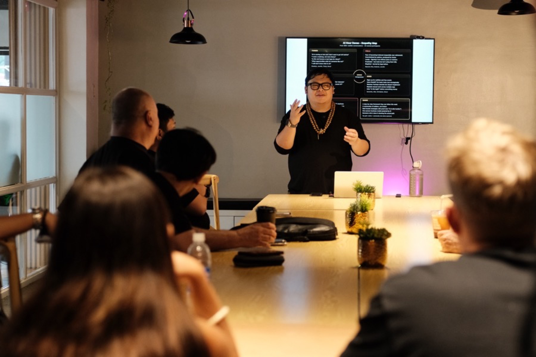 Cris teaching builders in a live room