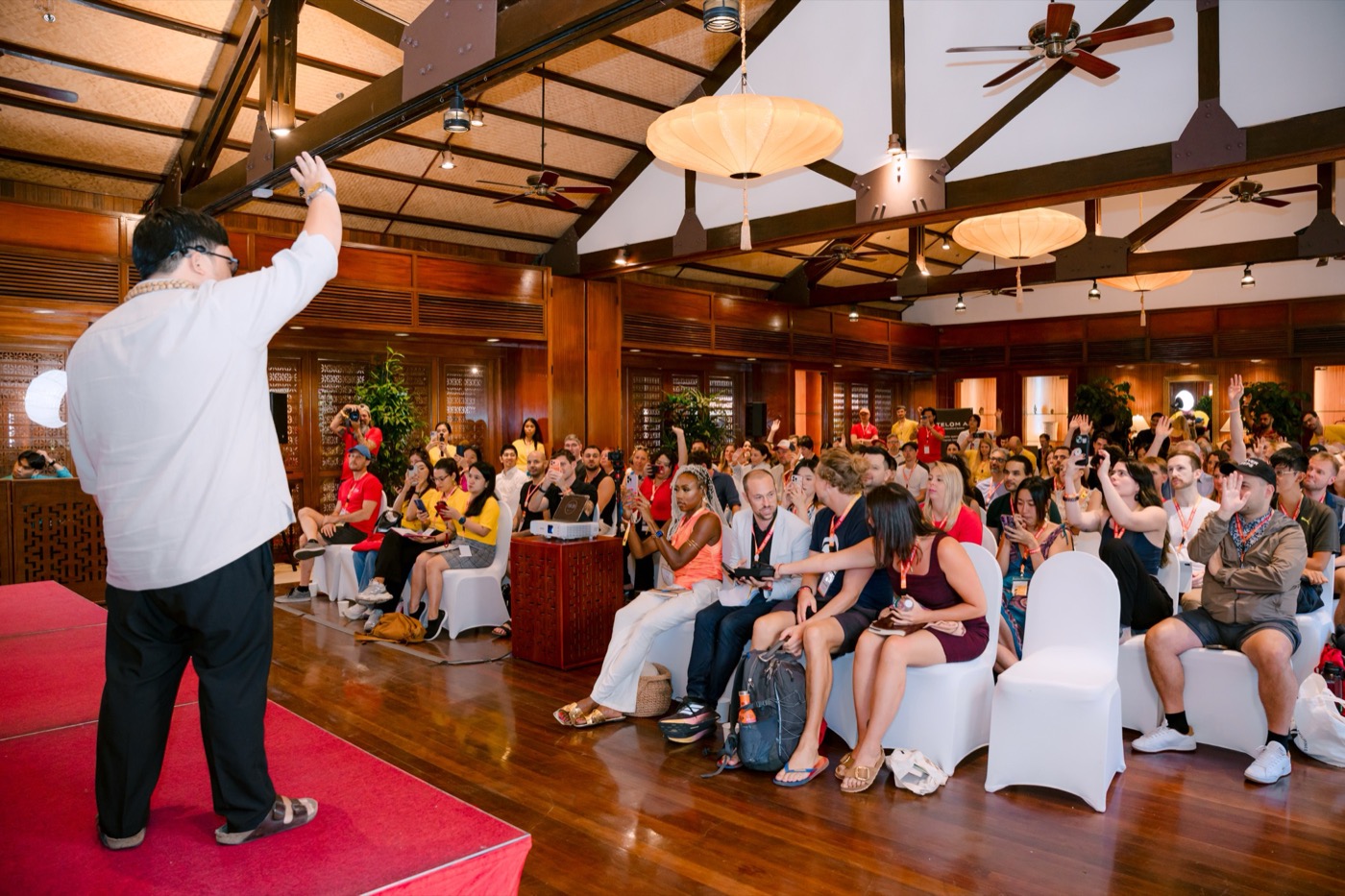 Engaged audience reacting during a talk